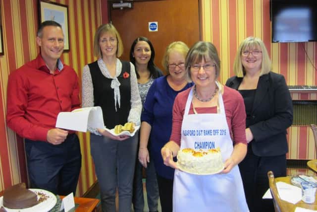 Bake off brilliance. Members of the team at Chartered Accountants Duncan & Toplis in Sleaford from left - David Mowbray, Karen Deacon, Sue Andrews, Gaynor Goulty, Sandra Clements and Karen Walker. EMN-161116-172851001