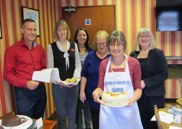 Bake off brilliance. Members of the team at Chartered Accountants Duncan & Toplis in Sleaford from left - David Mowbray, Karen Deacon, Sue Andrews, Gaynor Goulty, Sandra Clements and Karen Walker. EMN-161116-172851001
