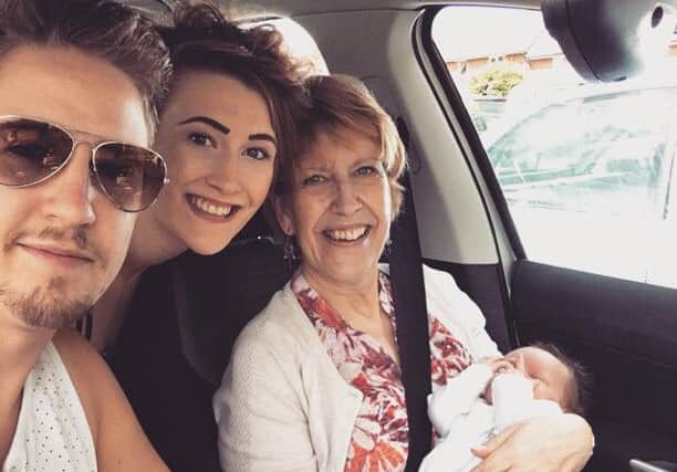Abi with her late mum Anne, brother Alex and nephew Oakley.