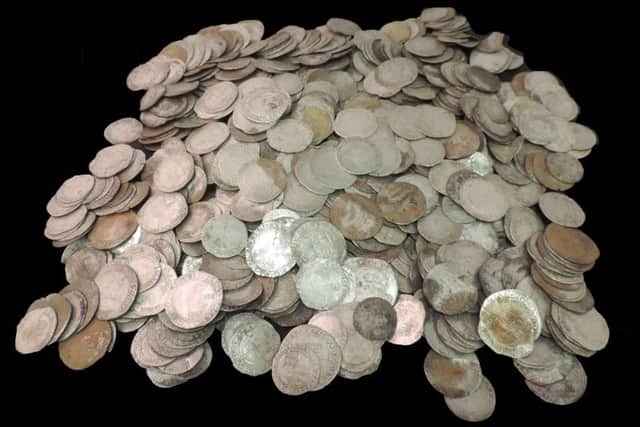 The fantastic hoard of coins dating back to the English Civil war and beyond. EMN-161116-130329001