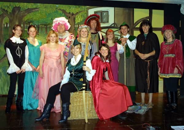 Wainfleet Theatre Club presenting Red Riding Hood as their 2004 pantomime in the Coronation Hall, with a slice of Robin Hood as well.