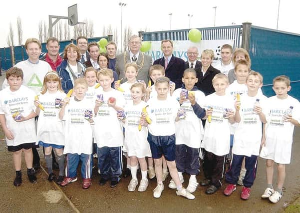Fishtoft Primary School pupils with Boston MP Mark Simmonds, the Mayor of Boston, Coun Richard Leggott, and representatives from Groundwork Lincolnshire at the opening of the refurbished sportsground at Peter Paine Sports Centre, in Boston, in December 2006.