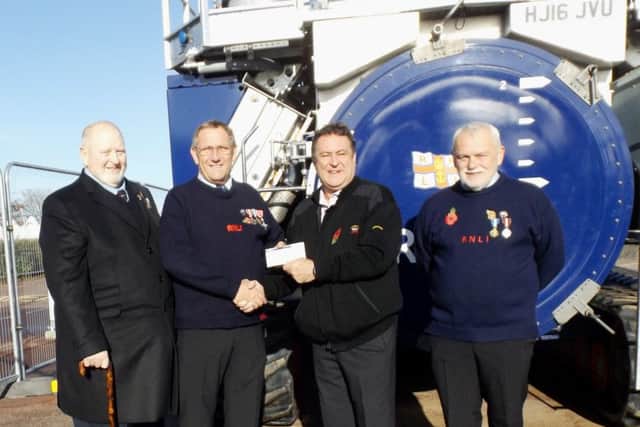 Presentation of funds from St Clement Lodge to the RNLI's Skegness Lifeboat. Pictured (from left) Mike Newbold, St Clement Lodge charity steward, RNLI Coxswain Ray Chapman, St Clement Lodge worshipful master Card Hird, and RNLI deputy coxswain Richard Watson.