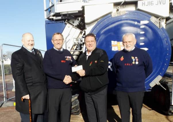 Presentation of funds from St Clement Lodge to the RNLI's Skegness Lifeboat. Pictured (from left) Mike Newbold, St Clement Lodge charity steward, RNLI Coxswain Ray Chapman, St Clement Lodge worshipful master Card Hird, and RNLI deputy coxswain Richard Watson.