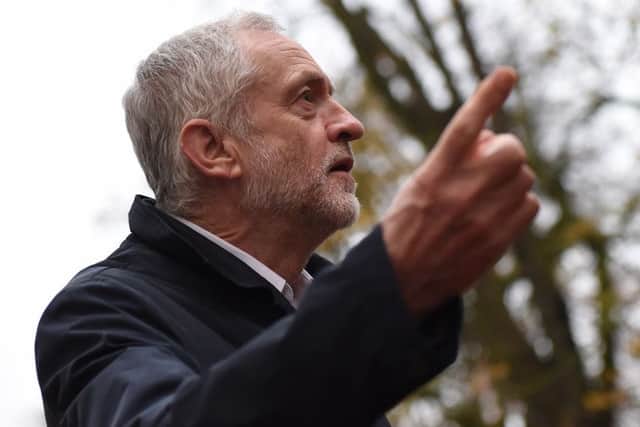 Jeremy Corbyn addresses the 100-strong crowd gathered in Sleafod's Boston Road Recreation Ground on Sunday. Photo: Toby Roberts EMN-161120-165141001
