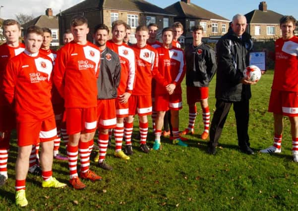 Skegness Town have been presented with a certificate and match ball after winning the Sills and Betteridge Team of the Month Award for October. Lincolnshire League representative Ian Hughes made the presentation to skipper Ben Davison prior to their county cup tie in Scunthorpe.