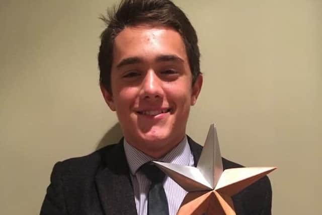 William Chico with the PE Progress Cup at Caistor Grammar School.