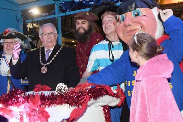 Mayor of Skegness Coun Dick Edginton and friends prepare to switch on the town tree lights. Photo: MSKP-241116-54 ANL-161125-154749001
