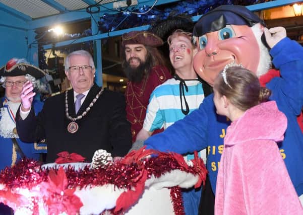 Mayor of Skegness Coun Dick Edginton and friends prepare to switch on the town tree lights. Photo: MSKP-241116-54 ANL-161125-154749001