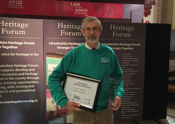 Chris Page from the Dogdyke Pumping Station with the heritage award EMN-161123-113404001