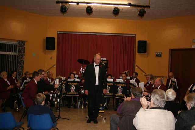 Richard Walker and the Alford Silver Band play to a packed Village Hall at Chapel St Leonards at a recent Remembrance Concert. ANL-161123-111245001