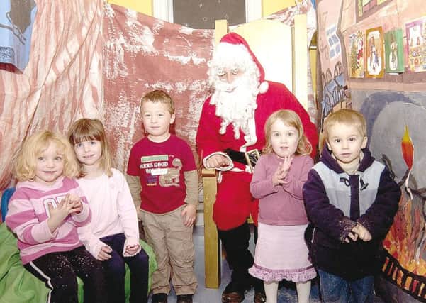Father Christmas makes a pre-Christmas stop at a playgroup in Swineshead in 2006. EMN-161123-165227001