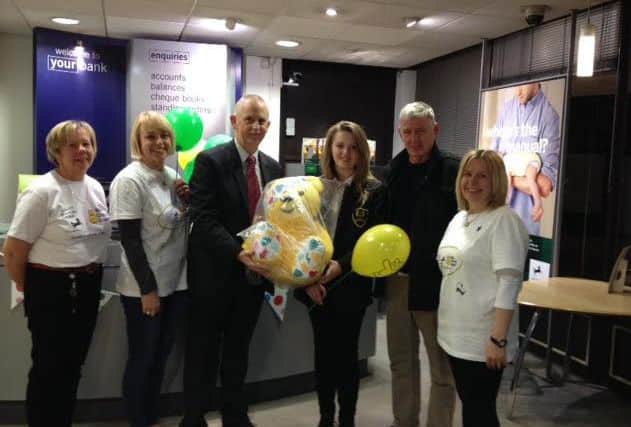 Staff at Lloyds Bank EMN-161123-120606001