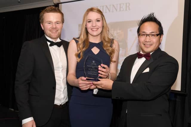 Che Shing Li, partner at Hodgkinsons, presents the Best New Business Award to Chuckling Cheese at Skegness Business Awards. Photo: .MSKP-181116-67 ANL-161125-122035001