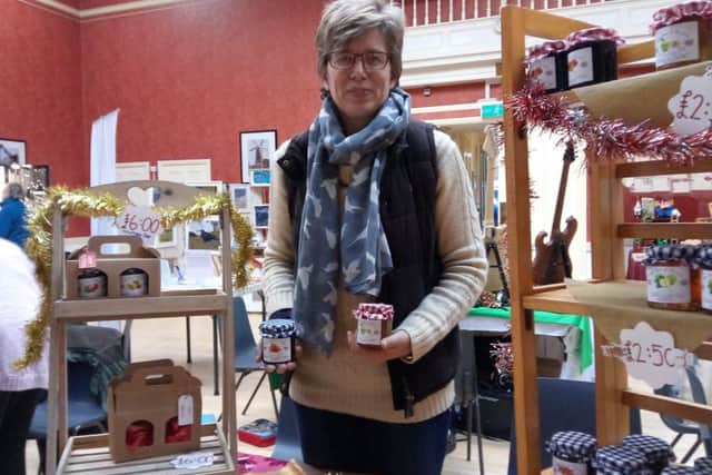 Sandra Scaman with her Cottage Jams and Preserves at Alford Craft Market ANL-161126-163521001