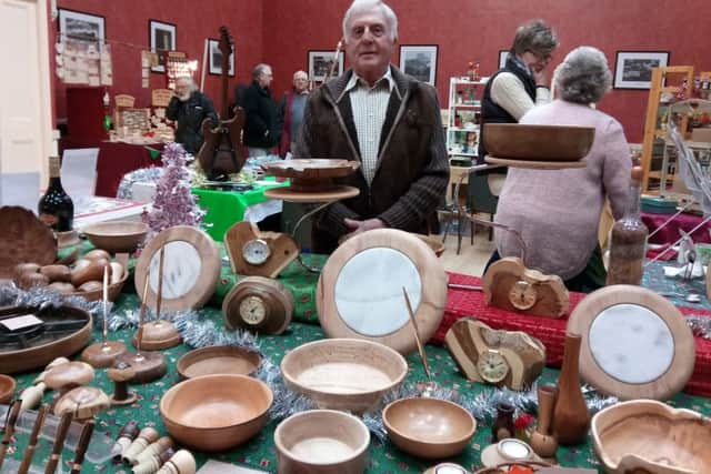 Wood turner Phil Taylor, of Markby, with his range of wooden gifts. ANL-161126-163921001