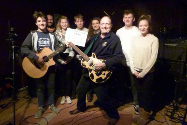 Salutation:from left, Isaac McCann, Ritchie Chappell, Sophie McCulloch, Joseph Dodd, Alex Mottram, Alex Bignell and Maya McCann with Lion Martyn Kemp. (Lin) EMN-160512-081219001