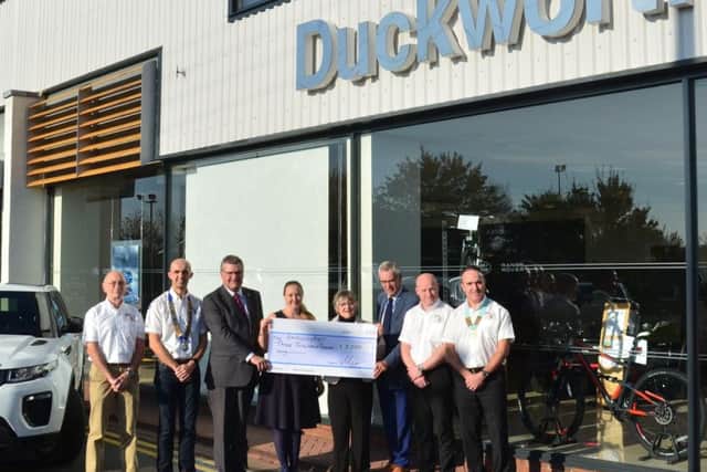 ?3,000 was handed over to the Lincs & Notts Air Ambulance after a track day sponsored by Market Rasen firm Duckworths EMN-160212-135054001