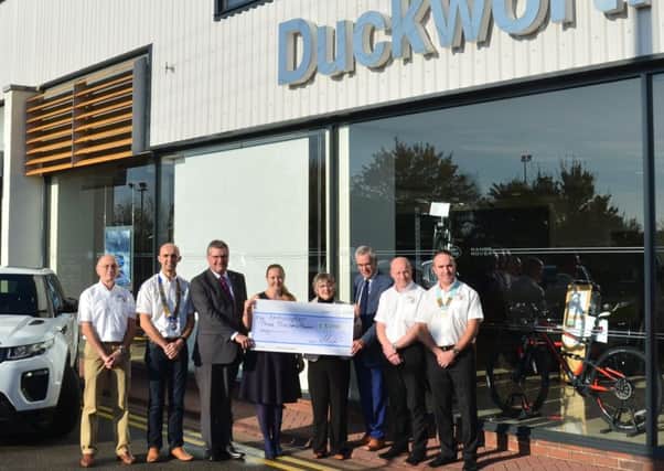 ?3,000 was handed over to the Lincs & Notts Air Ambulance after a track day sponsored by Market Rasen firm Duckworths EMN-160212-135054001