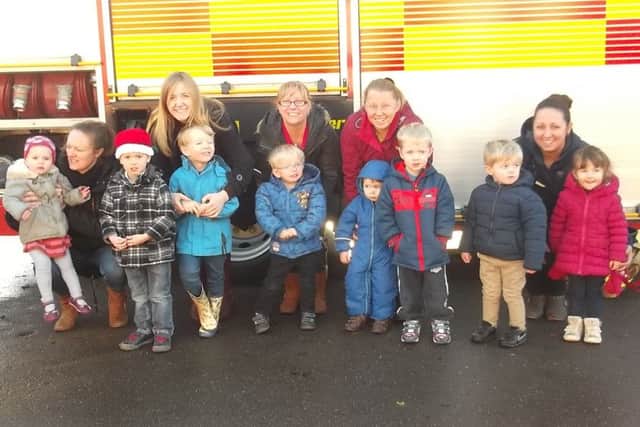 A scene from firefighters' visit to Swineshead Children's Centre.