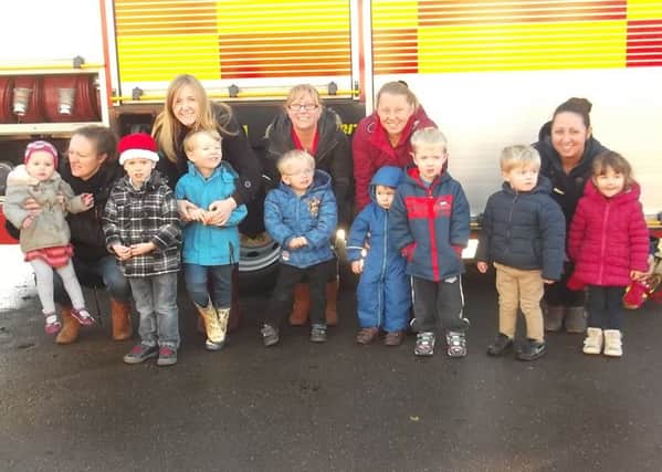A scene from firefighters' visit to Swineshead Children's Centre.