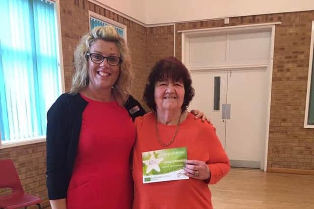Gill White after her 10 and a half stone loss with Slimming World Consultant Sarah Lote EMN-160212-135751001