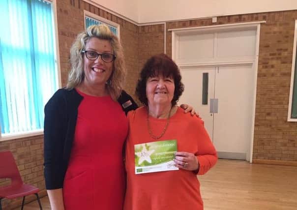 Gill White after her 10 and a half stone loss with Slimming World Consultant Sarah Lote EMN-160212-135751001