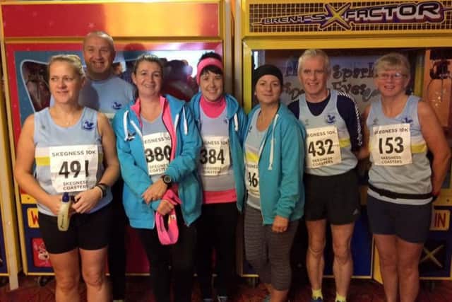 Mablethorpe Running Club group at the Skegness Coasters 10K - including vet winners Kev Harrison (second from right) and Debbie Jinks (right) EMN-161128-104850002