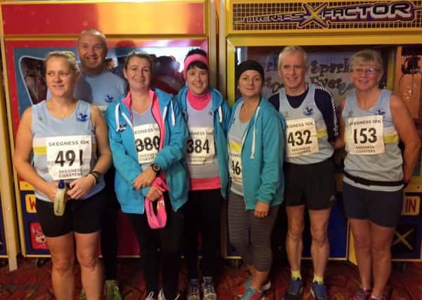 Mablethorpe Running Club group at the Skegness Coasters 10K - including vet winners Kev Harrison (second from right) and Debbie Jinks (right) EMN-161128-104850002