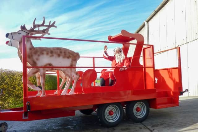 Santa aboard the new sleigh. EMN-161128-180615001
