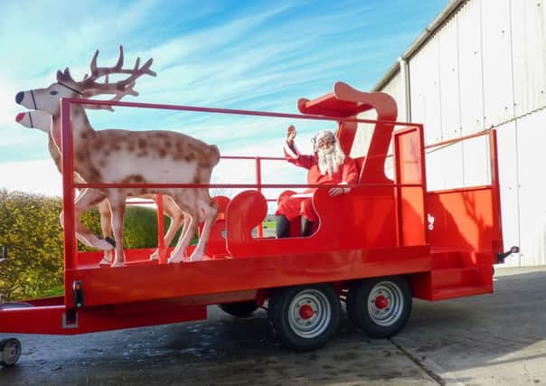 Santa aboard the new sleigh. EMN-161128-180615001