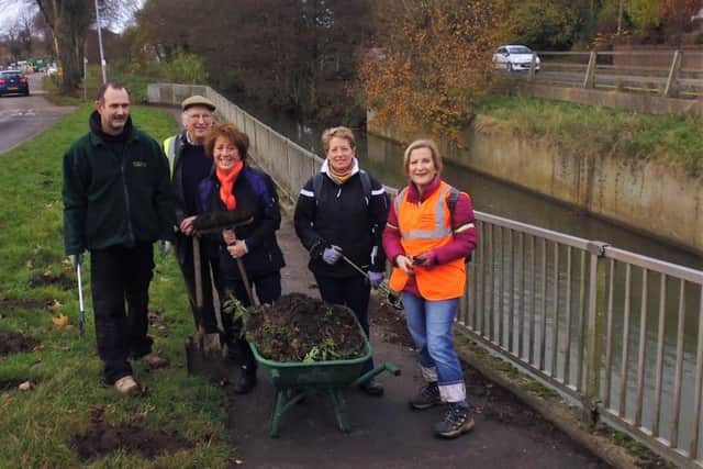 Members of Horncastle Walkers are Welcome Group have been out and about tidying the town. EMN-161129-144128001