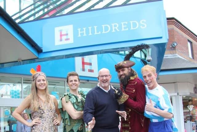 The cast of Peter Pan outside Hildreds shopping centre in Skegness, with centre manager Steve Andrews. EMN-161130-150926001