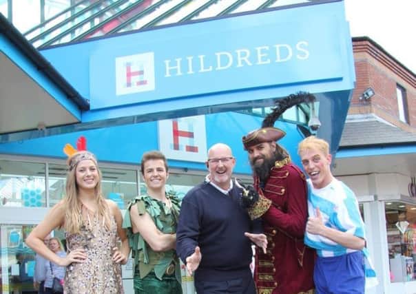 The cast of Peter Pan outside Hildreds shopping centre in Skegness, with centre manager Steve Andrews. EMN-161130-150926001