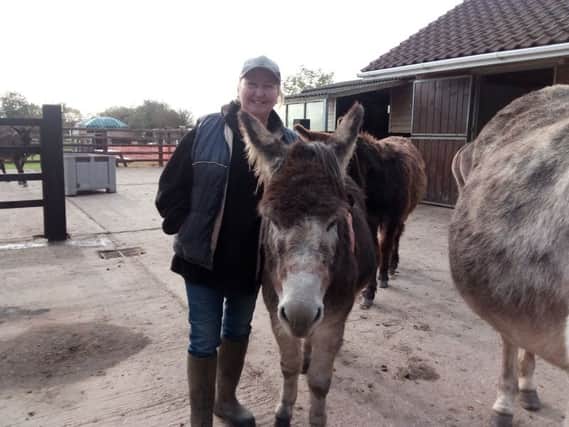 Tracy Garton with Alan at Radcliffe Donkey Sanctuary in Huttoft.