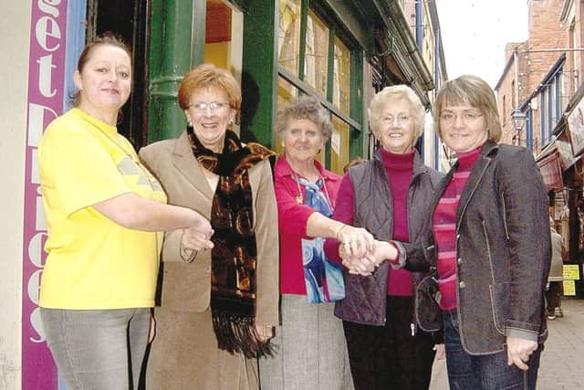 Student nurses presenting more than £1,600 to the Butterfly Hospice Trust in December 2006.
