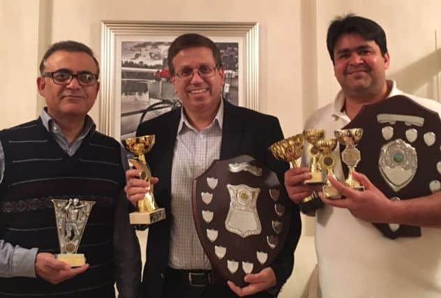 Pictured, from left, are Khawar Naeem (best bowler), Zubair Ahmed (skipper of the Division One Cup-winning side) and Imran Cheema (league player of the year).