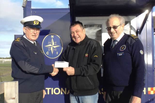 Cheque presentation to National Coastwatch Institution Skegness from St Clement Lodge.