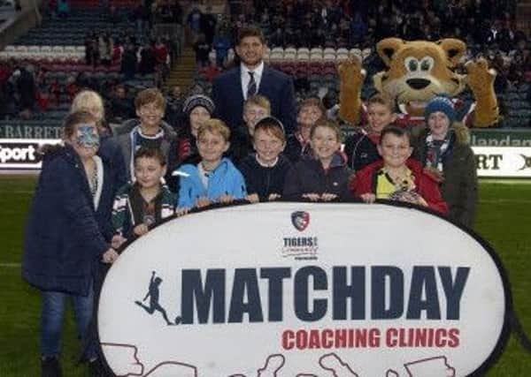 Sleaford RFC youngsters soak up the atmosphere at Welford Road.