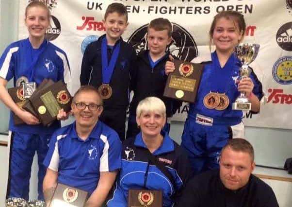 Evolution Fighters and Coaches. Pictured are Nesta Baxter, Mackenzie Warrant, Riley Brocklesby, Chelsea Leggatt, Nigel Baxter, Linda Baxter and Lee Brocklesby.