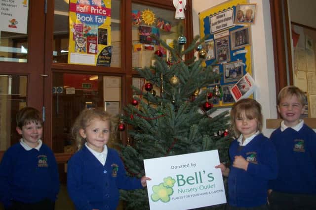 Pupils from Stickney Primary School with their tree from Bells Nursery Outlet, of Benington.