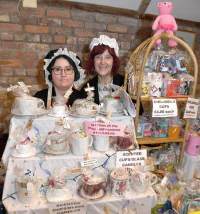Sonya Price and Carol Price, of Burgh le Marsh, with scented candles and knitted items of Burgh le Marsh. at the Village Church Farm' Victorian Christmas. Photo: MSKP-041216-7 ANL-160612-165008001