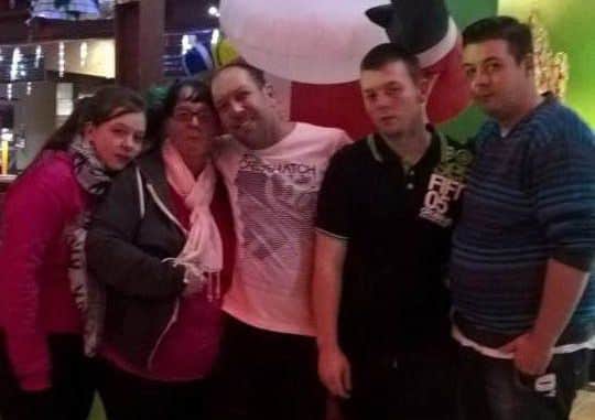 Anthony and Sharon Baker and family last night, safe, but homeless after the Sea Lane Hotel fire. Photo supplied. EMN-161112-110341001