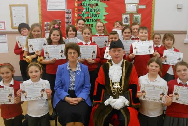 Pupils with their certificates presented to them by Coun Stephen Woodliffe EMN-161219-142750001