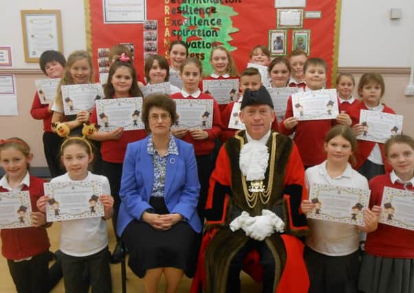 Pupils with their certificates presented to them by Coun Stephen Woodliffe EMN-161219-142750001