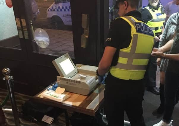Skegness police during an operation iin local pubs and clubs. Councillors have praised the efforts of officers to keep the town safe. ANL-161219-073042001