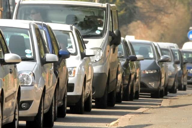 Could a new joint approach between a district council and the county council lead to an end to traffic snarl-ups like this in Wragby?