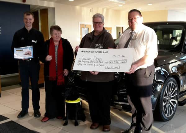 Duckworths has presented ?1186.44 to representatives of the Guide Dogs for the Blind Association EMN-161215-160642001