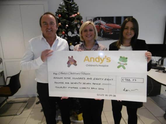 Thurlby Motors raised more than Â£900 for Andy's Children's Hospice EMN-161215-163523001