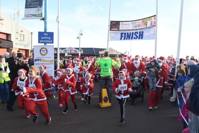 And they're off.... the Skegness Santa Run. Photo: MSKP-111216-32 ANL-161212-101248001